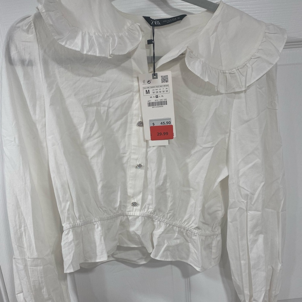 White peplum top
